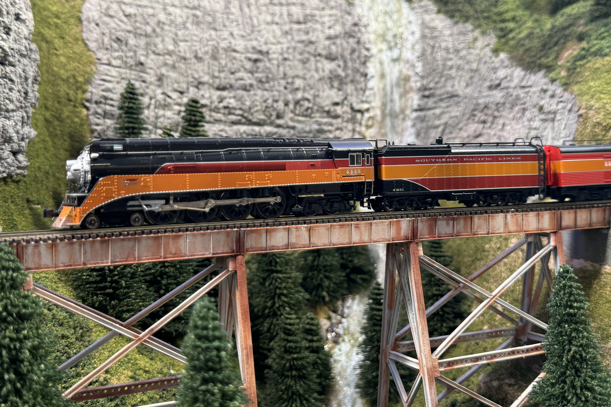 Southern Pacific Daylight passenger train taveling over a trestle. Southern Pacific Daylight passenger train taveling over a trestle.