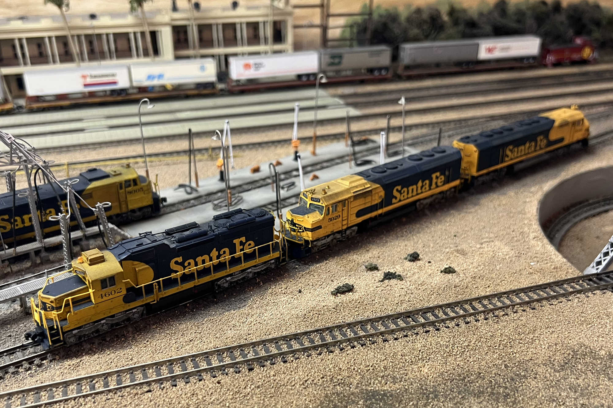 Several Santa Fe locomotives on Mike Komo's n scale model railroad layout. Several Santa Fe locomotives on Mike Komo's n scale model railroad layout.